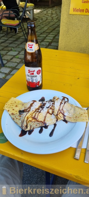 Foto eines Bieres der Marke Stiegl Goldbru aus der Brauerei Stieglbrauerei